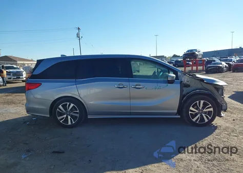 2022 Honda Odyssey Touring from USA, damaged, VIN 5FNRL6H87NB067599